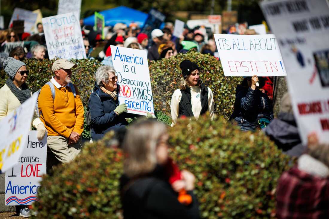 People listens as speakers address the gathered comity for the third No Kings rally on Saturday, March 28, 2026 in Richmond, Virginia.
