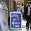 A man walks past a polling place at City Hall in Providence, R.I., on Nov. 5, 2024.
