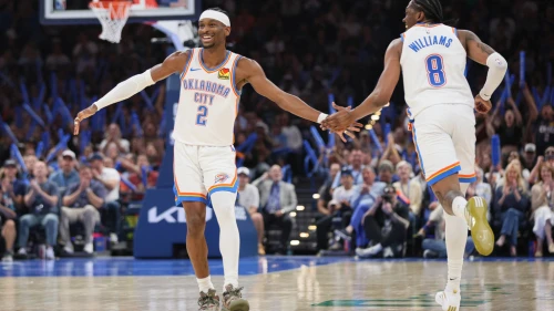Oklahoma City Thunder guard Shai Gilgeous-Alexander (2) and guard Jalen Williams (8) celebrate after a basket by Williams during the second half of an NBA basketball game Sunday, March 29, 2026, in Oklahoma City. (AP Photo/Nate Billings)