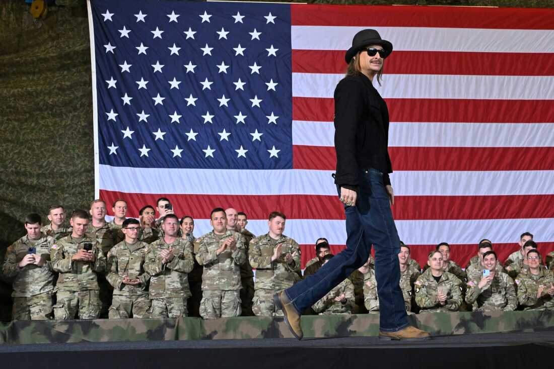 FILE - Kid Rock comes on stage to speak and introduce Vice President JD Vance during a visit to Fort Campbell, Ky., Nov. 26, 2025.