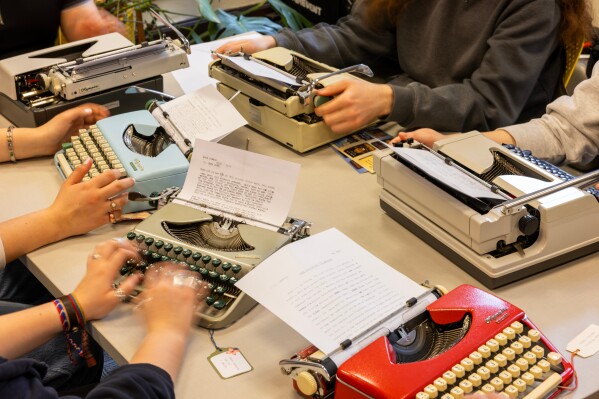 Students use typewriters to complete a writing assignment in German at Cornell University, Friday, March 20, 2026, in Ithaca, N.Y. Their professor, Grit Matthias Phelps, brings out the typewriters once each semester for students to disconnect from technology and connect with the assignment in a different way. (AP Photo/Lauren Petracca)