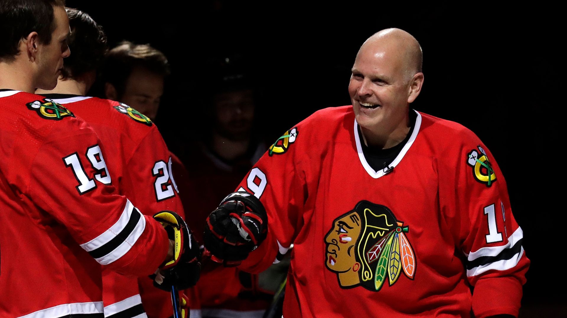 FILE - Troy Murray, right, greets Chicago Blackhawks center Jonathan Toews before an NHL hockey game against the Ottawa Senators, Wednesday, Feb. 21, 2018, in Chicago.