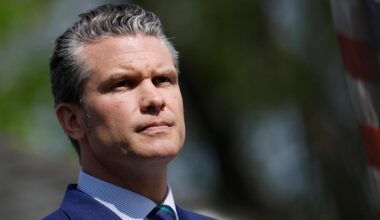 Behind the US' commander-in-chief Pete Hegseth