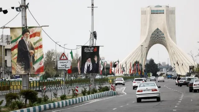 Banners of the late Supreme Leader of Iran, Ayatollah Ali Khamenei, seen in Tehran on Monday