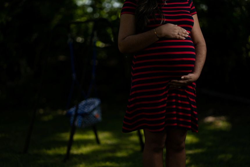 Barbara, a 35-year old pregnant asylum-seeker from Cuba, poses for a portrait in Louisville, Kentucky, on May 9, 2025.