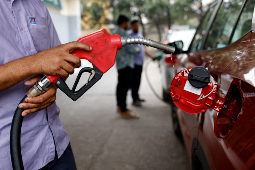 Fuel droplets fall from the nozzle after refuelling a car at a fuel station, as concerns grow over fuel supply amid U.S.-Israel conflict with Iran, in Dhaka, Bangladesh, on March 10, 2026.