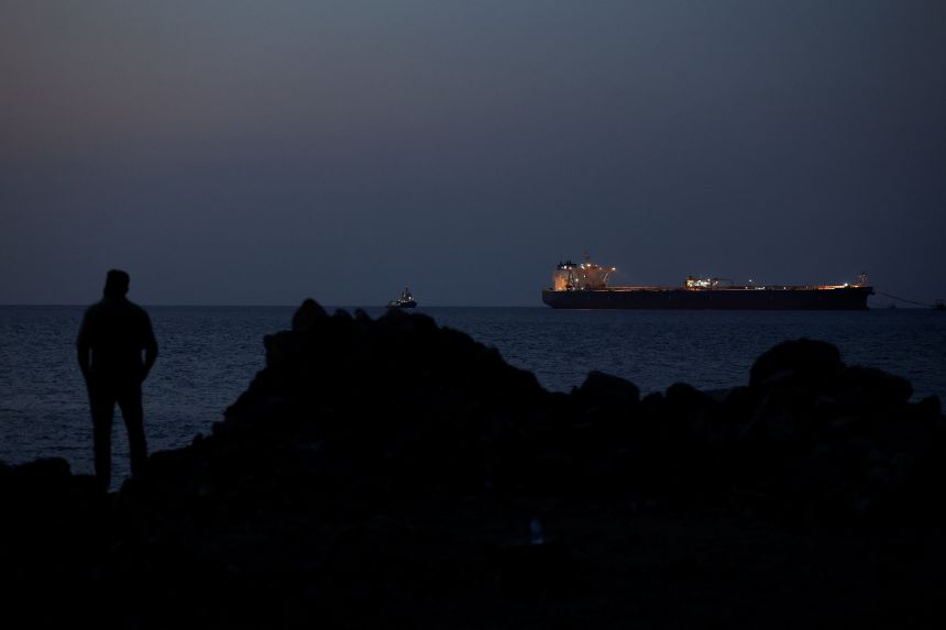 The Parnassos crude oil tanker sits anchored in Muscat, Oman, on March 10 during a near-shutdown of traffic through the Strait of Hormuz.