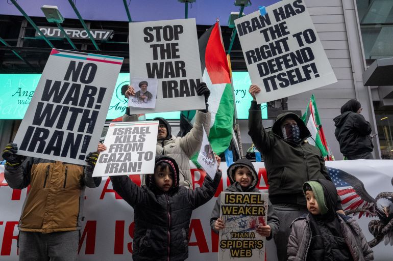 Demonstrators gather at Times Square for Al-Quds Day in Manhattan, New York City, U.S., March 13, 2026. REUTERS/David 'Dee' Delgado
