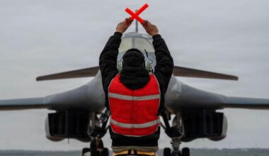 A US Air Force B-1B Lancer bomber is marshalled by a crew chief after returning from a mission in support of the Operation Epic Fury attack on Iran to an undisclosed location in the United States.