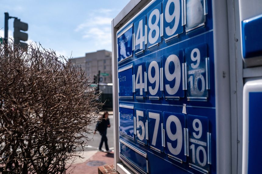 Gas prices are seen at a gas station on Capitol Hill on March 19.