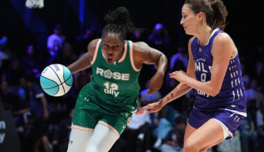 Rose BC guard Chelsea Gray (12) drives past Lunar Owls wing Rebecca Allen (9) in their Unrivale ...