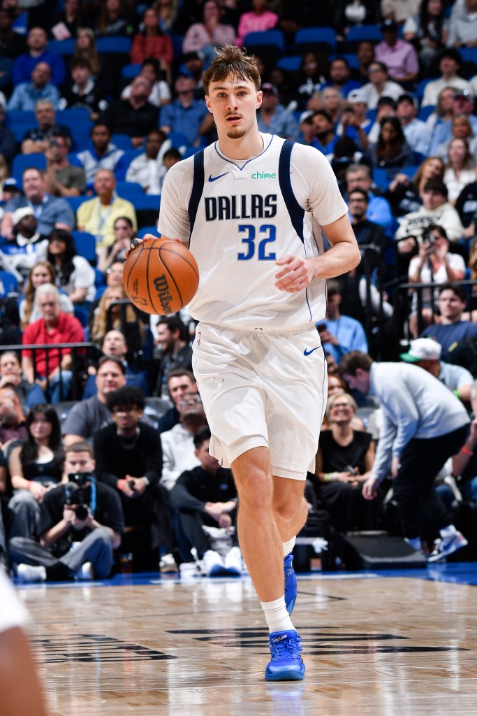 Cooper Flagg dribbles the ball up the court for the Dallas Mavericks