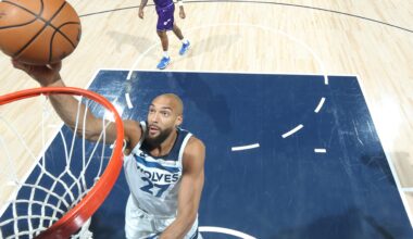 Rudy Gobert drives to the basket for a layup.