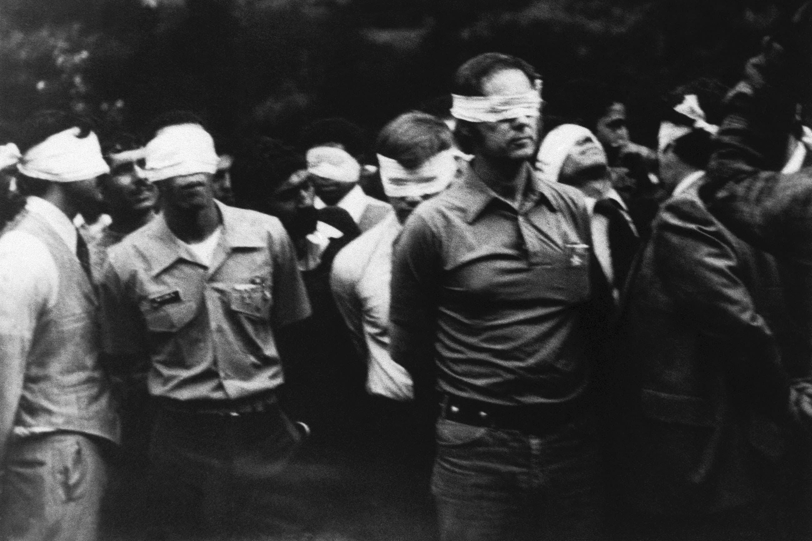 Hostages Being Led by Blindfold