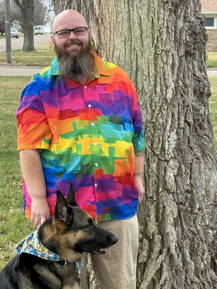 Matthew Neumann and his service dog, Zelda.