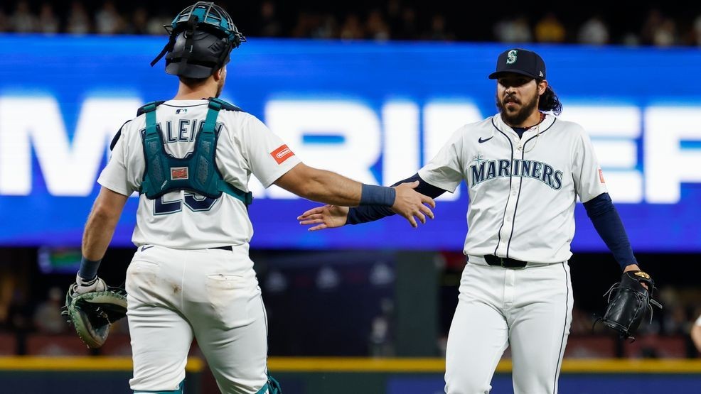Cal Raleigh #29 and Andrés Muñoz #75 of the Seattle Mariners shake hands after the game against the Pittsburgh Pirates at T-Mobile Park on July 05, 2025 in Seattle, Washington. The Seattle Mariners won 1-0. (Photo by Alika Jenner/Getty Images)