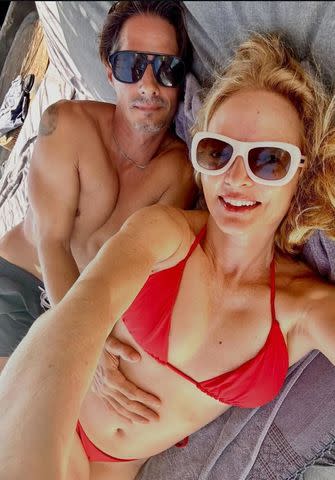 Heather Graham in a red string bikini with boyfriend Michele CivettaCredit: Instagram/Heather Graham