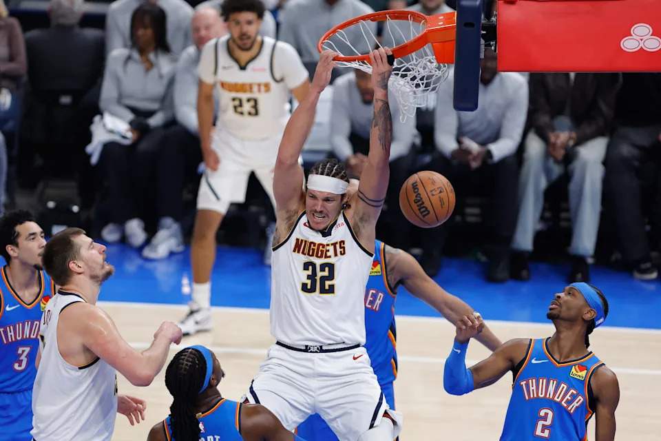 Mar 9, 2026; Oklahoma City, Oklahoma, USA; Denver Nuggets forward Aaron Gordon (32) dunks against the Oklahoma City Thunder during the first quarter at Paycom Center. Mandatory Credit: Alonzo Adams-Imagn Images