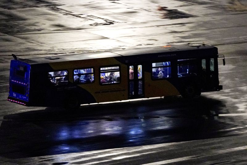 Air Canada regional jet collides with fire truck in New York's LaGuardia, killing both pilots