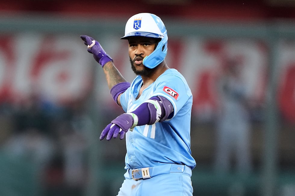 Kansas City Royals' Maikel Garcia celebrates on second after hitting a two-run double during...