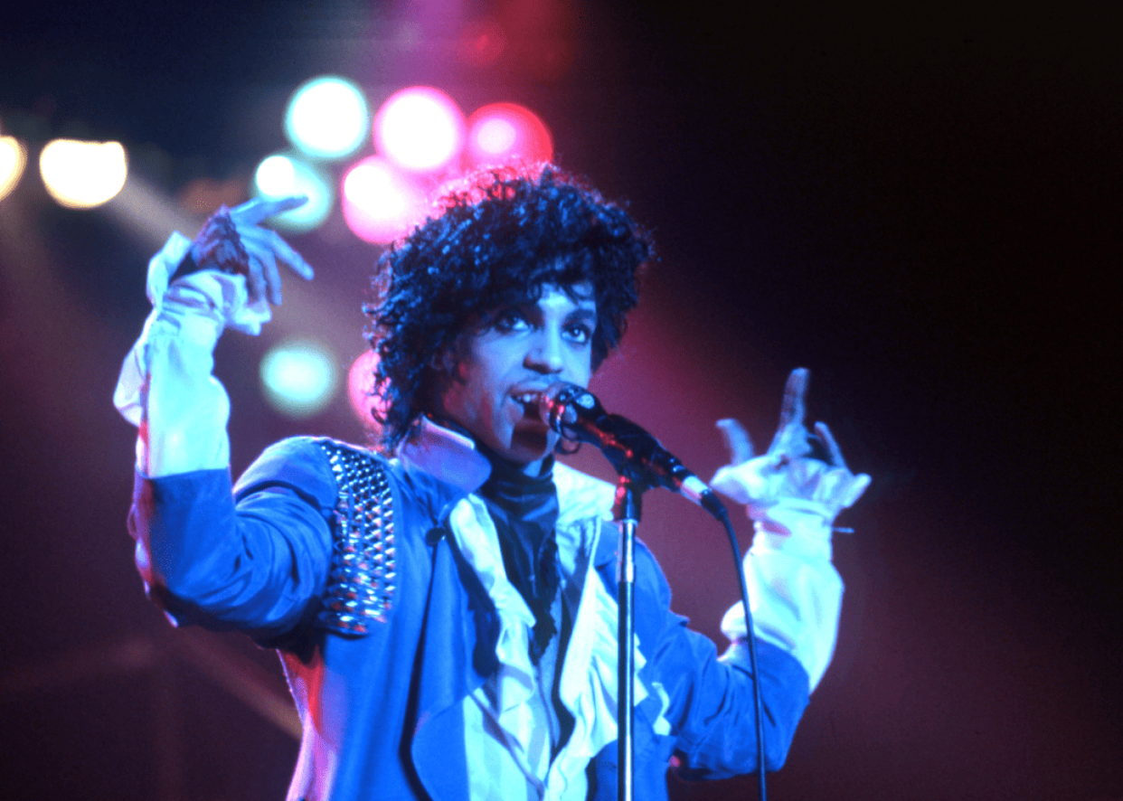 Prince performs onstage during the 1984 Purple Rain Tour at the Joe Louis Arena in Detroit, Michigan.  - 