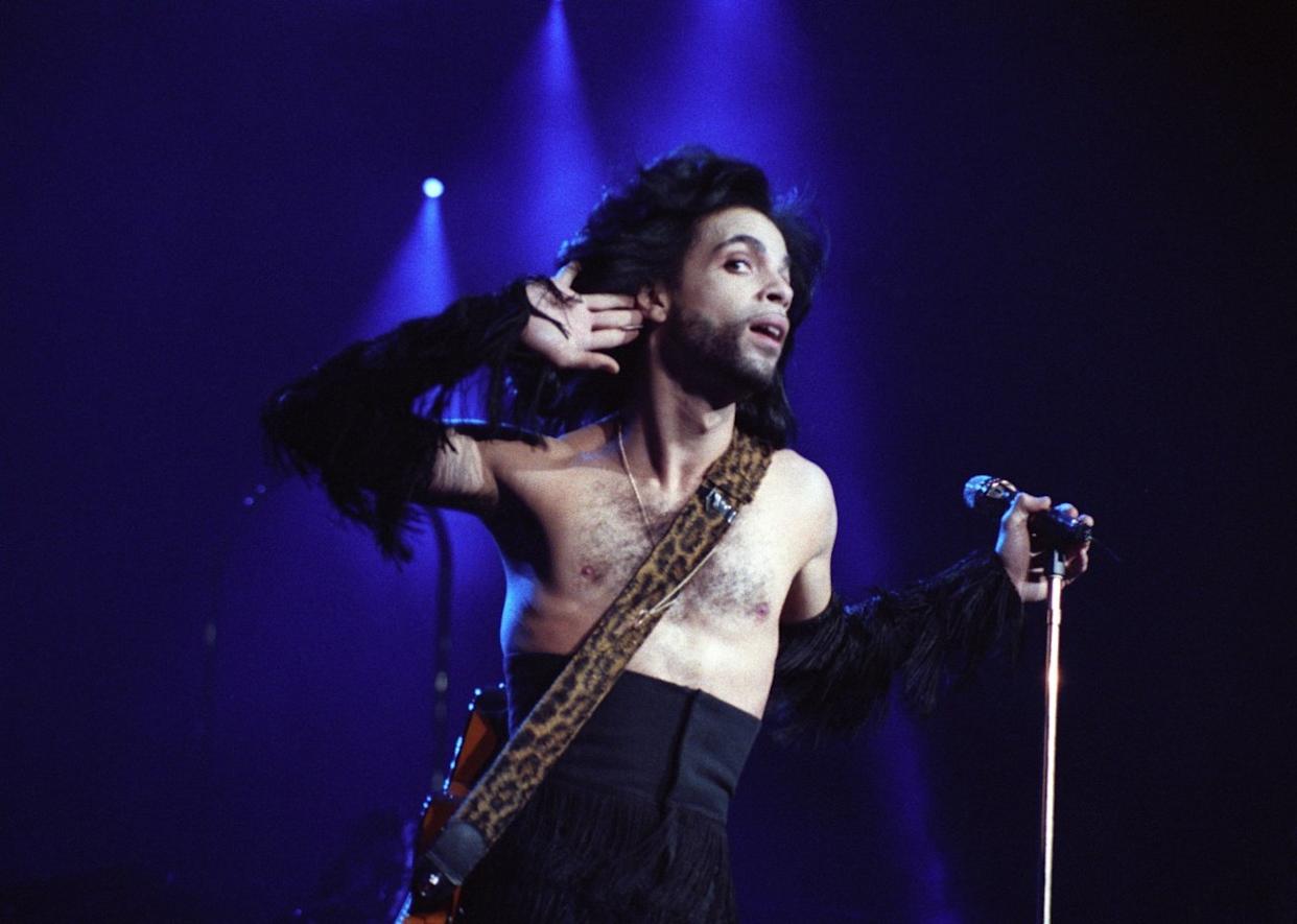 Prince performs during the Nude Tour at the St. Paul Civic Center Arena. - 