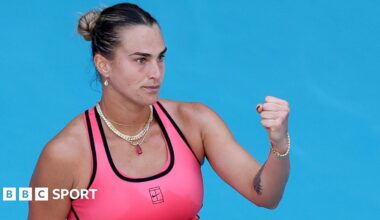 Aryna Sabalenka celebrates winning a point with a clenched fist