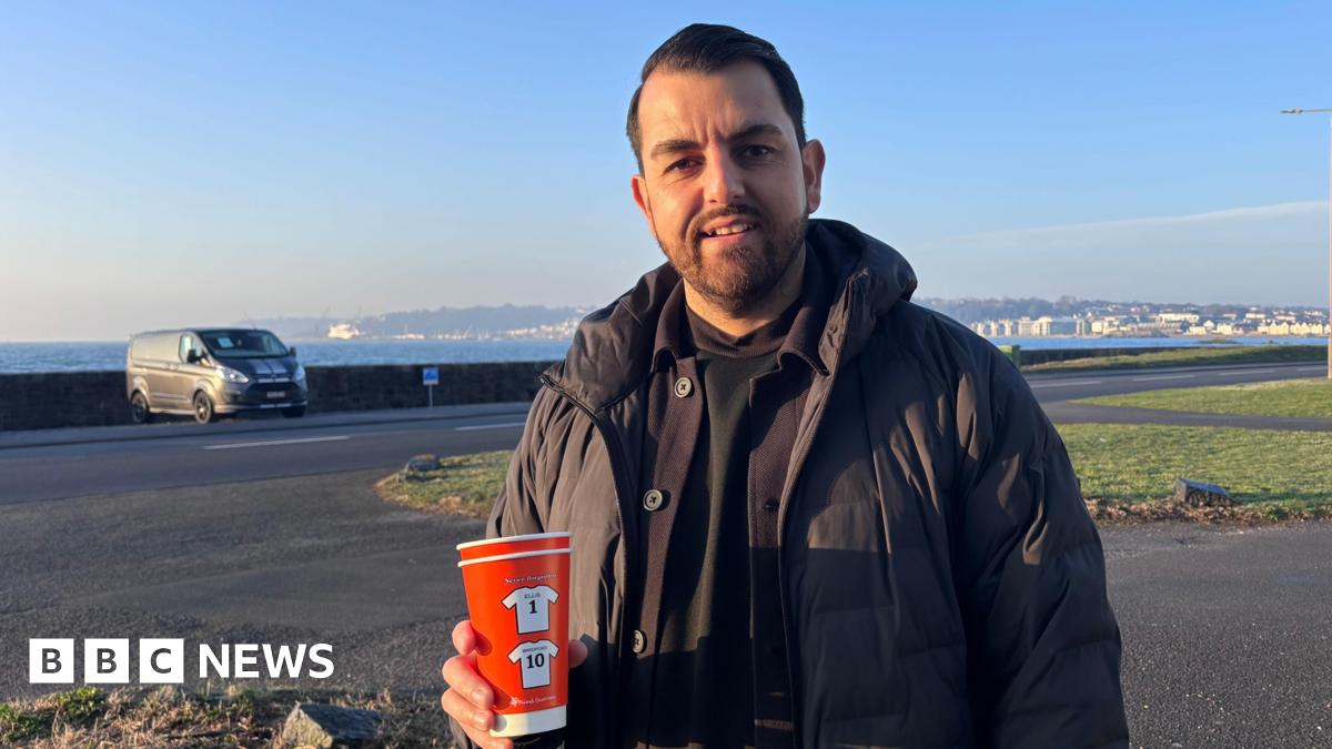Mental health support information leaflets from Mind and a red memory cup in honour of the men who died.
