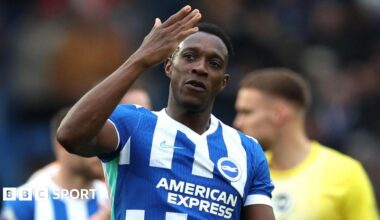 Brighton striker Danny Welbeck waves to fans after victory over Nottingham Forest