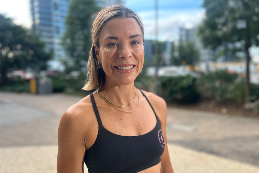 a woman in a black crop top