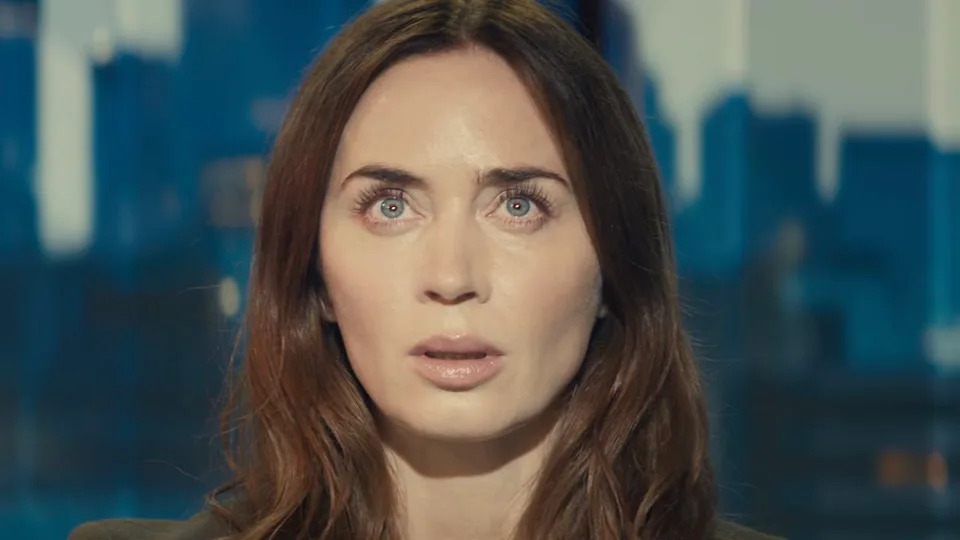  Emily Blunt's meteorologist looking up into bright light in Disclosure Day. 