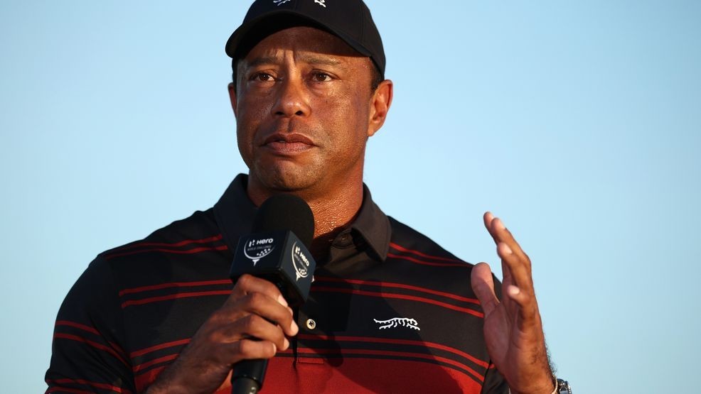 NASSAU, BAHAMAS - DECEMBER 07: Tiger Woods of the United States speaks during the trophy presentation on the 18th green after the final round of the Hero World Challenge 2025 at Albany Golf Course on December 07, 2025 in Nassau, Bahamas. (Photo by Jared C. Tilton/Getty Images)