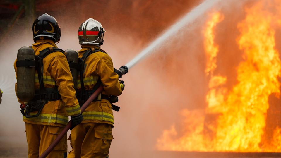 Firefighters putting out a fire