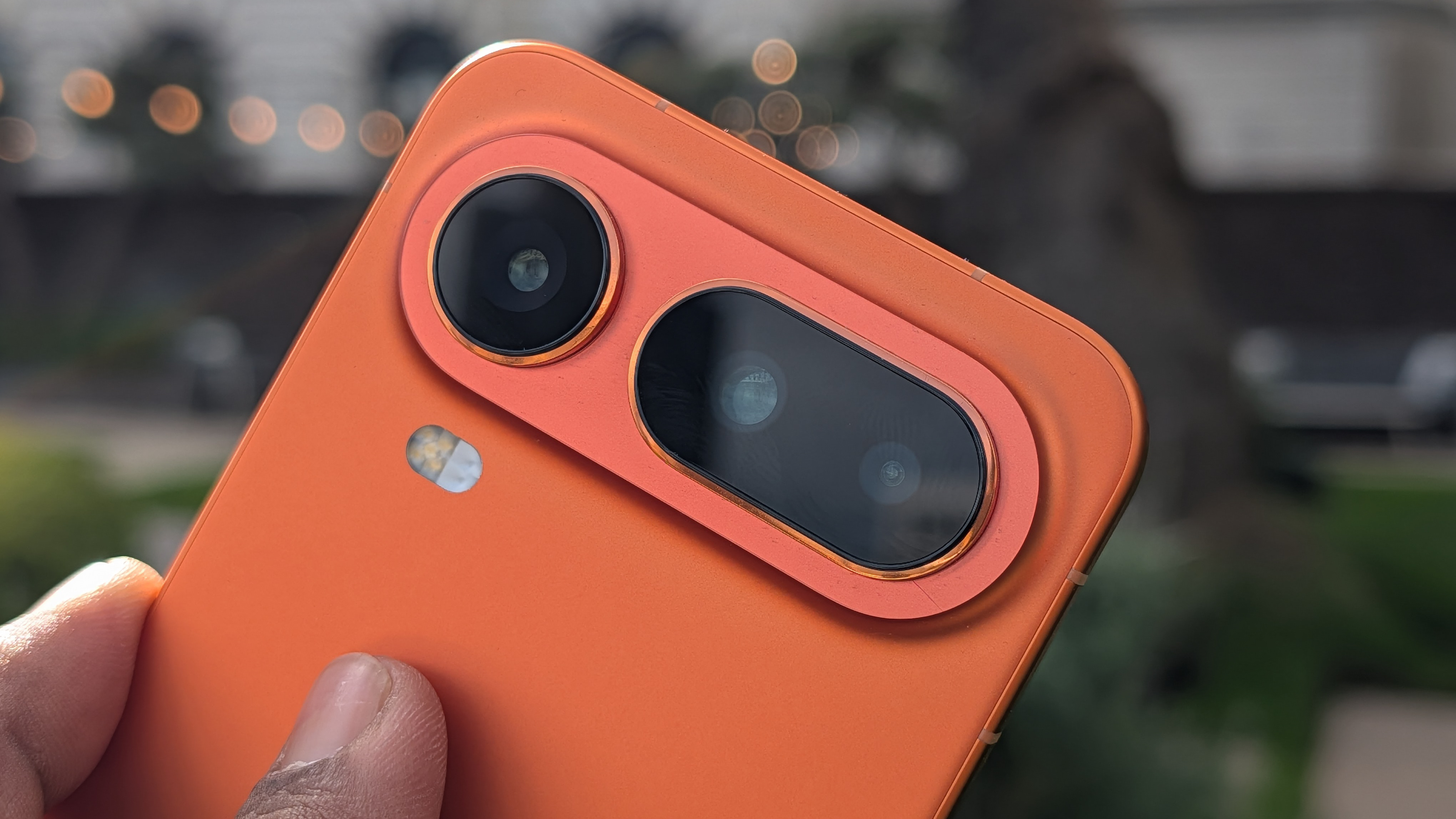 Camera on the Honor Magic 8 Pro Air in orange in the hand