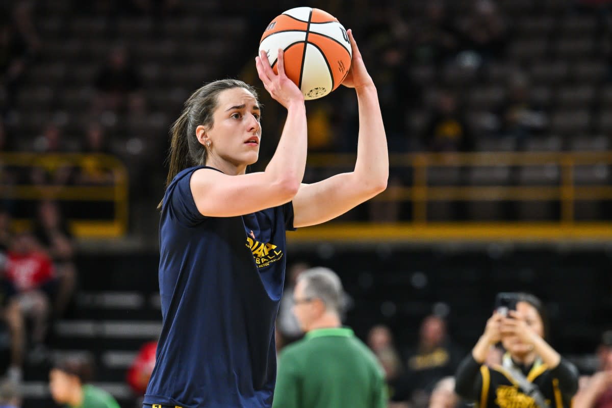 Indiana Fever guard Caitlin Clark warms up before a WNBA game.Jeffrey Becker-Imagn Images
