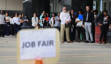 'Older, Experienced Workers' Have Less Cause for Concern About AI: Dallas Fed