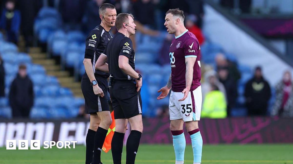 Ashley Barnes speaks to official