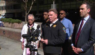 Officials give update after officer shot during hostage situation