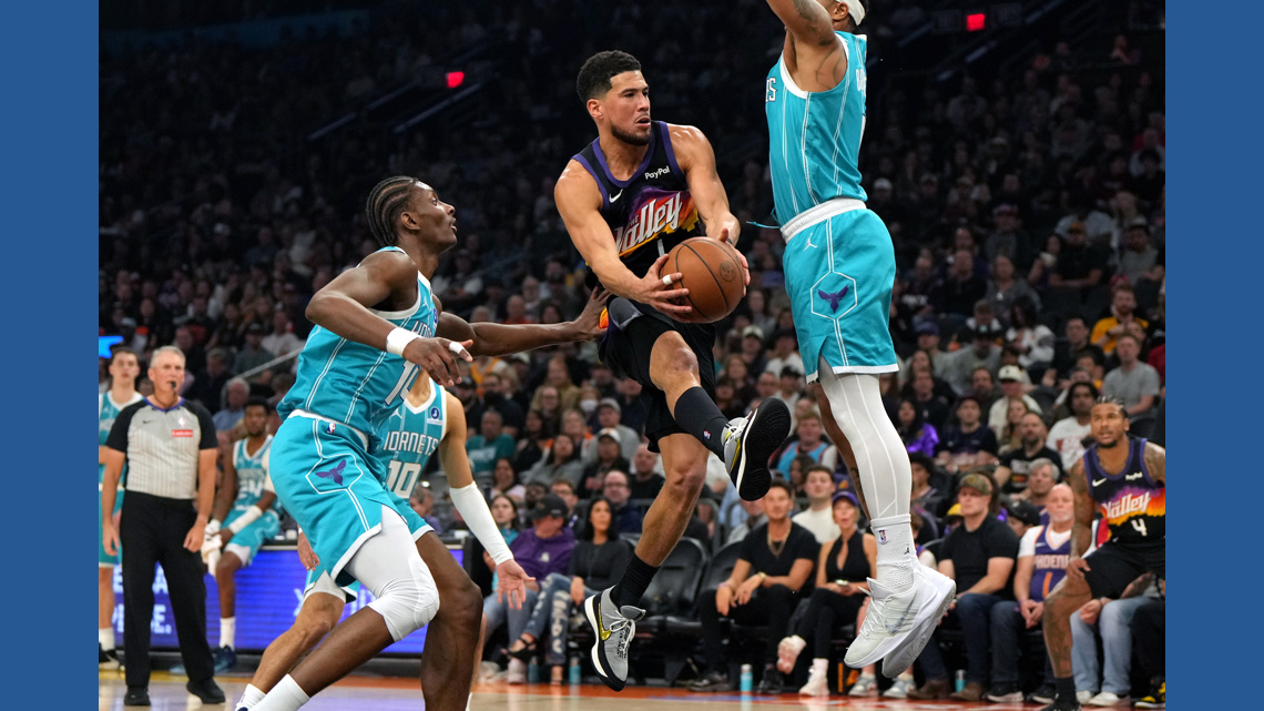 Booker scores 30 points as Suns halt Hornets' road winning streak at 10 with 111-99 victory