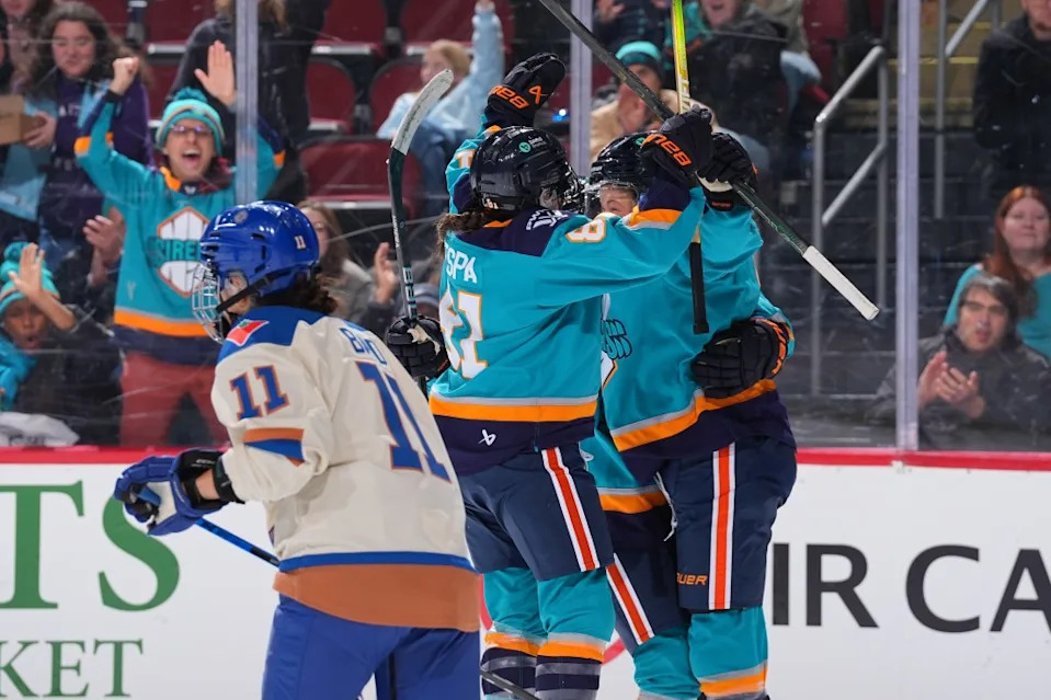 Savannah Norcross of the New York Sirens celebrates with teammates after scoring her first PWHL goal during the third period of the game against the Vancouver Goldeneyes on December 31, 2025 at the Prudential Center in Newark, New Jersey. Getty Images