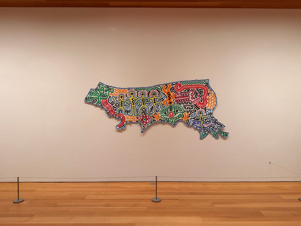 Haring's Untitled, 1983, Acrylic on leather work on a wall