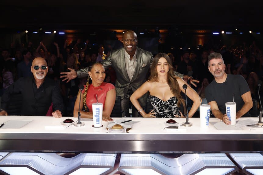 Terry Crews poses with the judges on AGT Episode 2018,