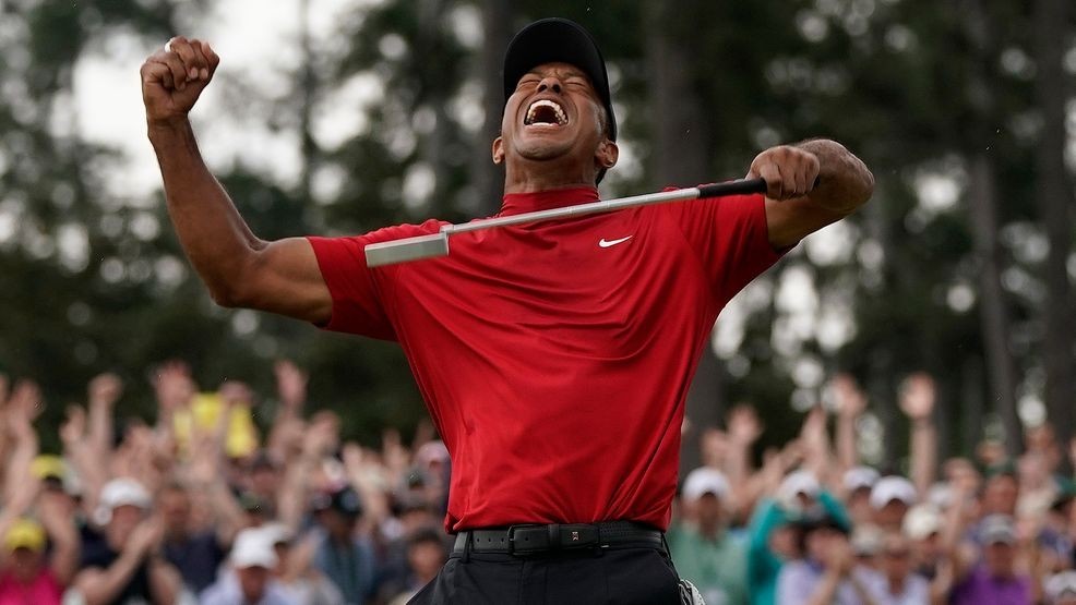 FILE - In this April 14, 2019, file photo, Tiger Woods reacts as he wins the Masters golf tournament at Augusta National in Augusta, Ga. (AP Photo/David J. Phillip, File)
