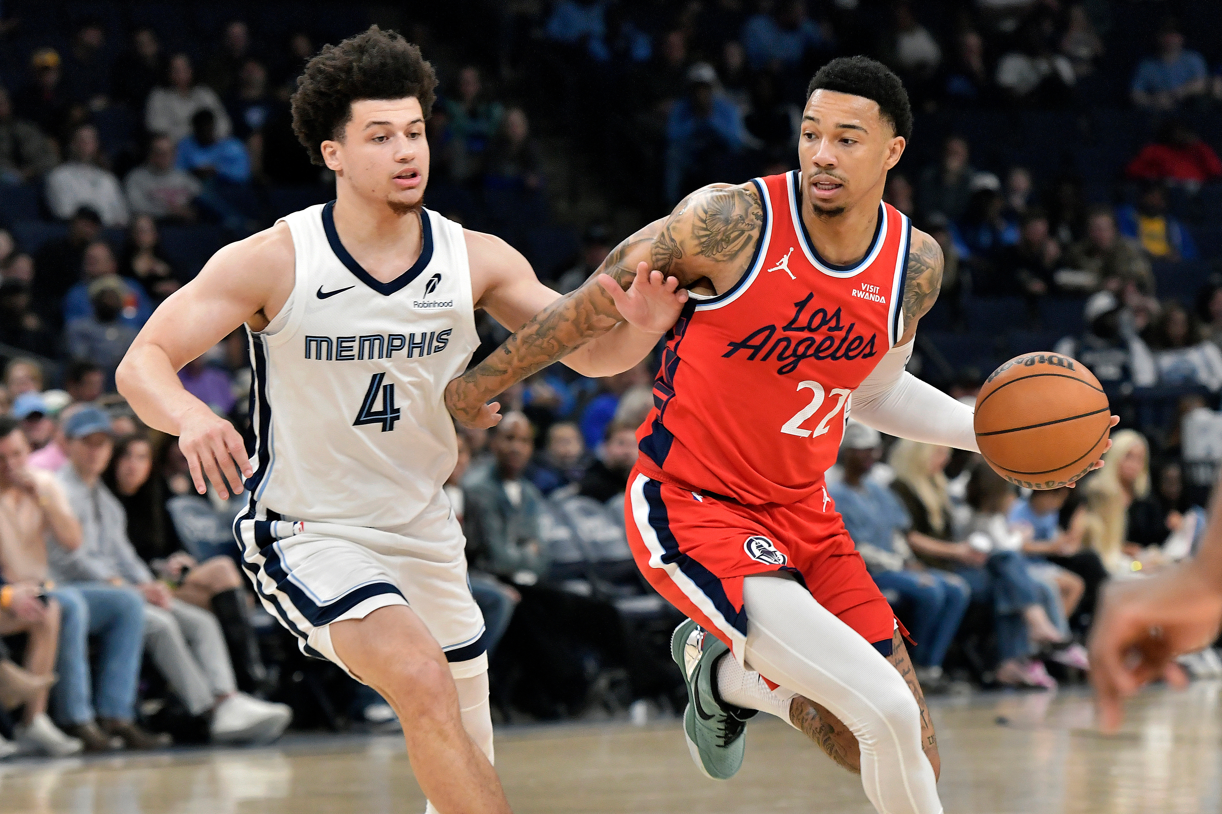 Clippers guard Jordan Miller (22) handles the ball against Memphis...
