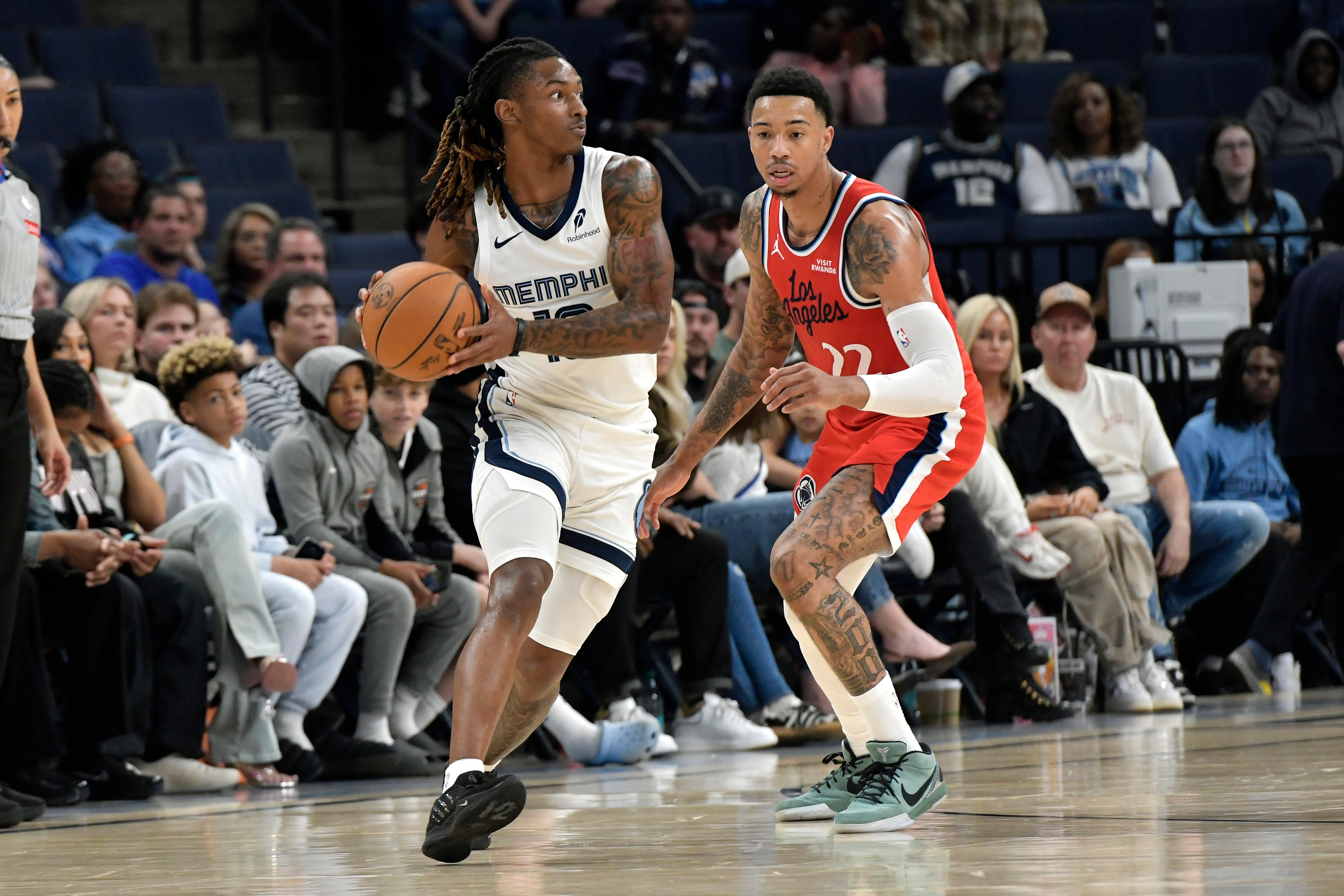 Memphis Grizzlies guard Javon Small, left, handles the ball against...