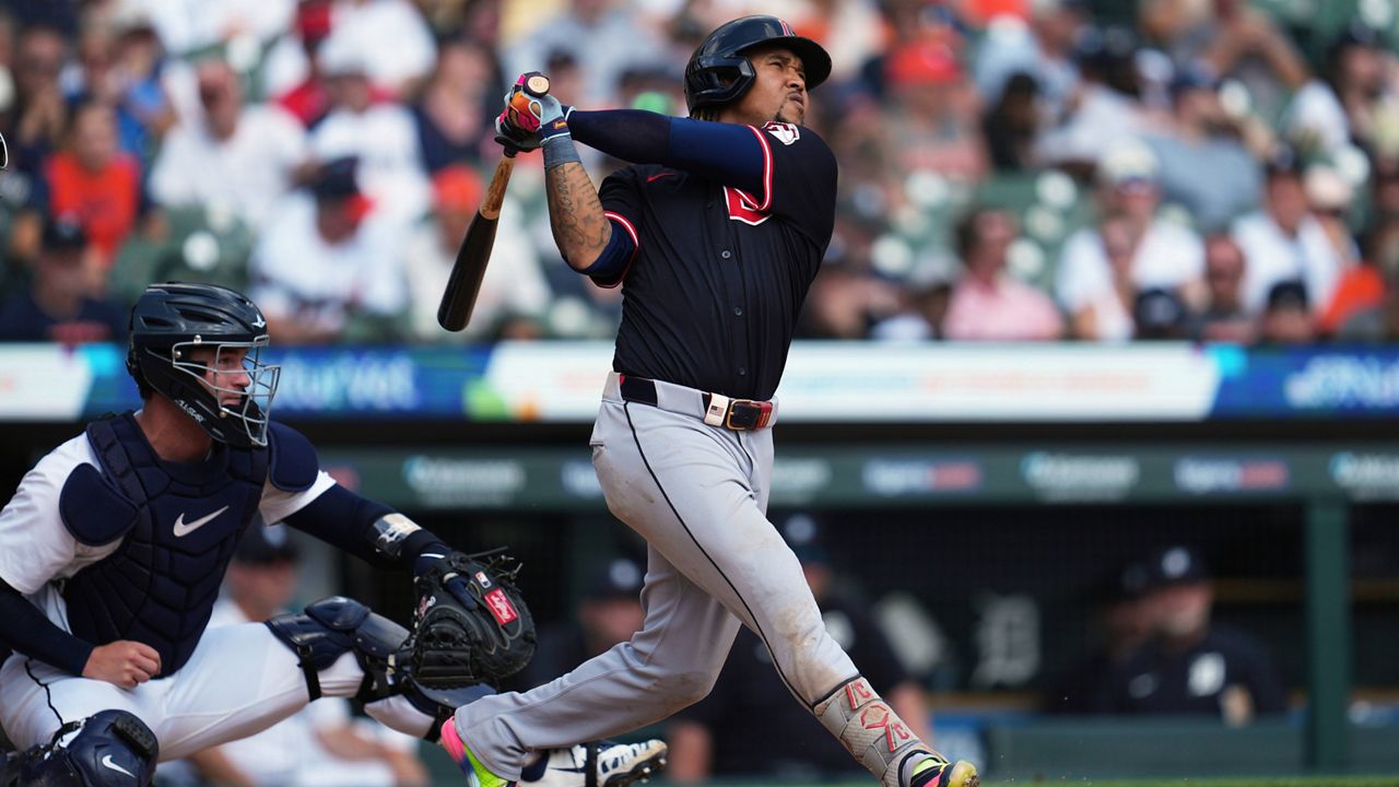 Cleveland Guardians' Jose Ramírez celebrates his two-run home run against the Detroit Tigers during the seventh inning of a baseball game Thursday, Sept. 18, 2025, in Detroit. (AP Photo/Paul Sancya)