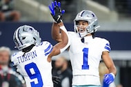 Dallas Cowboys wide receiver Jalen Tolbert (1) celebrates with wide receiver KaVontae Turpin...