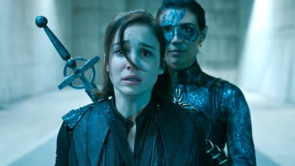 Ava looking scared in Warrior Nun with Lilith behind her