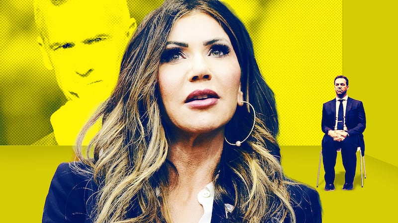 Kristi and Byron Noem with Corey Lewandowski in the background.