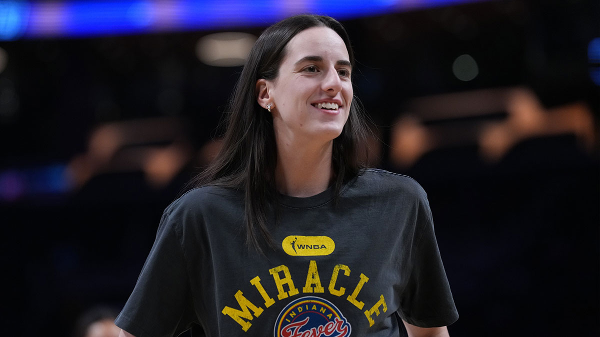 Indiana Fever guard Caitlin Clark (22) smiles during pregame warmups against the LA Sparks at Crypto.com Arena.